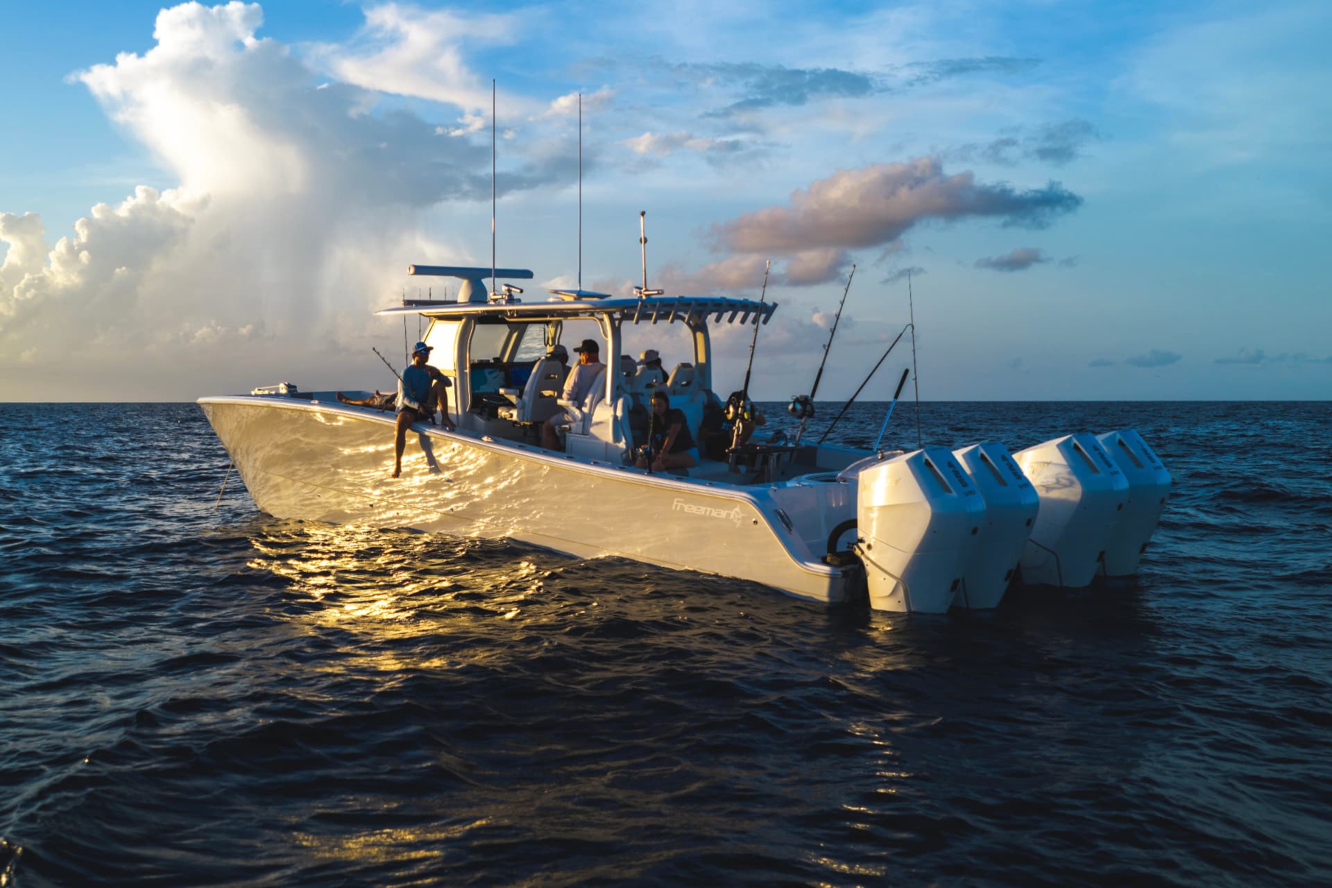 The 42' Freeman offshore at sunset with anglers aboard
